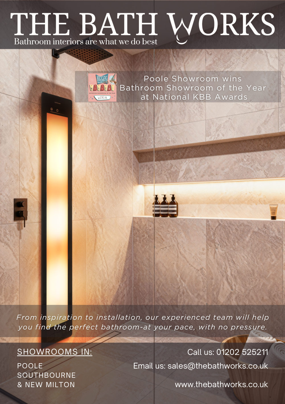 Full-page advert: a Sunshower panel glowing amber in a marble-tiled walk-in shower with a lit niche, headed Poole Showroom wins Bathroom Showroom of the Year at National KBB Awards.